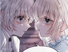 a boy and a girl are looking at each other in a close up .