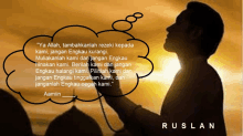 a man prays with a thought bubble that says ruslan