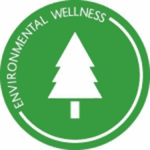 a green circle with a white christmas tree inside of it and the words `` environmental wellness '' .