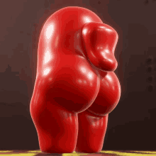 a statue of a red among us character with a large butt