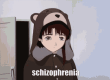 a girl wearing a teddy bear hooded jacket has the word schizophrenia on the bottom