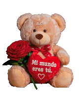 a teddy bear is holding a red rose and a red heart that says mi mundo eres tu