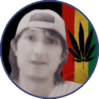 a man wearing a hat with the letter c on it is standing in front of a marijuana leaf