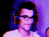 a blurry picture of a person wearing headphones and glasses