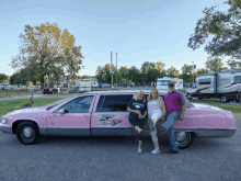 a group of people standing in front of a pink limousine that says ' jacksonville ' on the side