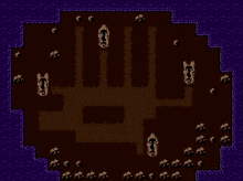 a screenshot of a video game with skulls and rocks on the ground