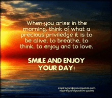 a quote from inspiringandpositivequotes.com encourages people to smile and enjoy their day