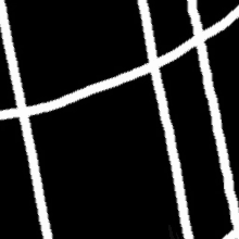 a close up of a black background with white lines on it .