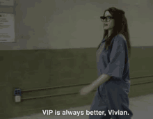 a woman in a prison uniform says vip is always better