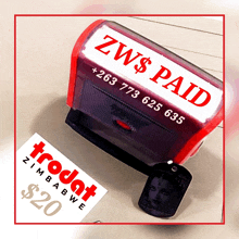 a trodat stamp that says zw $ paid is on a piece of paper