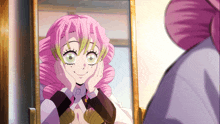 a girl with pink hair looks at herself in the mirror