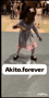 a little girl in a dress is dancing on a dance floor with a sign that says akito forever .