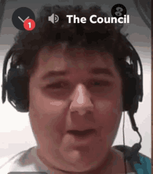 a man wearing headphones and a microphone with the council written on the bottom