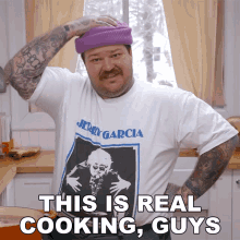 a man wearing a jerry garcia shirt says this is real cooking