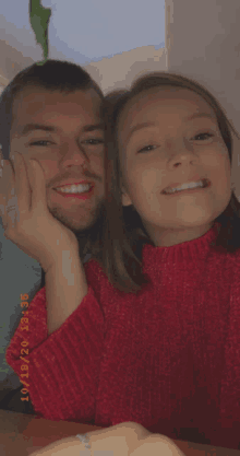 a man and a woman are posing for a picture with the date 10/18/21 at the bottom