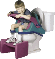 a young boy is sitting on a toilet with a purple stool