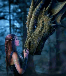 a woman is touching a dragon 's face in a dark forest