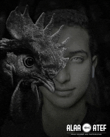 a black and white photo of a man with a rooster covering half his face