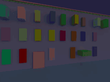 a wall with a bunch of different colored blocks on it