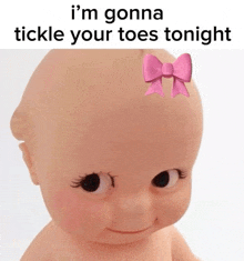 a baby doll with a pink bow on it 's head says " i 'm gonna tickle your toes tonight "