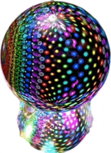 a colorful disco ball with a reflection of it