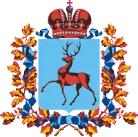 a coat of arms with a deer and a crown on it