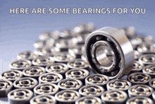 a pile of bearings with the words here are some bearings for you