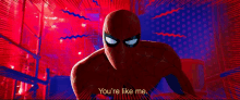 a close up of a spiderman with the words `` you 're like me '' written on it .