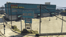 a large building with a sign that says mega mall on it