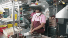 a man wearing a pink shirt and apron is preparing food in a kitchen with the words so there is a prata flipper below him