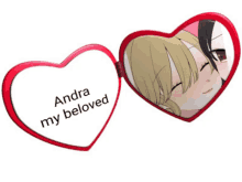 a heart shaped mirror that says andra my beloved on it