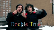 a couple of men sitting on a bench with the words double true written above them