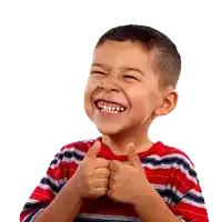 a young boy in a red and blue striped shirt is giving a thumbs up