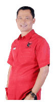 a man wearing a red shirt with a black logo on the pocket