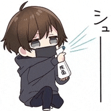 a boy wearing a mask is holding a spray bottle and spraying it .