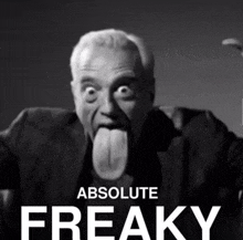 a black and white photo of a man sticking his tongue out with the words absolute freaky behind him