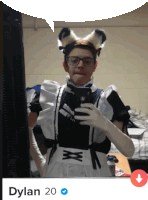 a man in a maid costume takes a selfie with the name dylan 20 on the bottom right