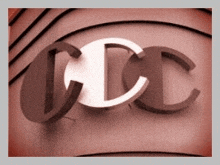 the letters cdc are stacked on top of each other on a building