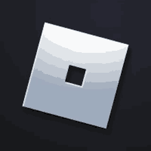 a white square with a black square in the middle on a black background .