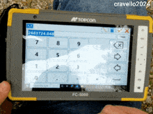 someone is using a topcon fc 5000 tablet