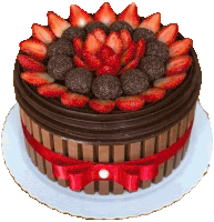 a chocolate cake with strawberries and chocolate balls