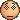 a close up of a pixelated smiley face with a sad look on it .