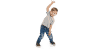 a young boy in a gray shirt and blue jeans is standing with his arm in the air