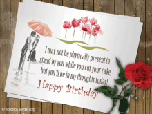 a happy birthday card with a red rose