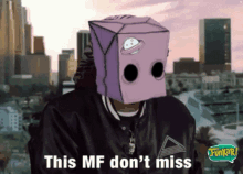 a man with a purple box on his head says this mf do n't miss