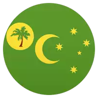 a green circle with a yellow crescent moon and stars on it