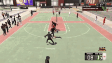 a basketball game is being played on a court with a score of 15 to 08