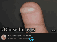 a blurred image of a person 's finger with the words r / blursedimages