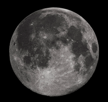 a full moon against a black background with a few spots of light