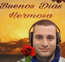 a man is wearing headphones and holding a red rose .